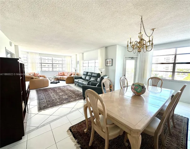 a living room with furniture or couch and a window