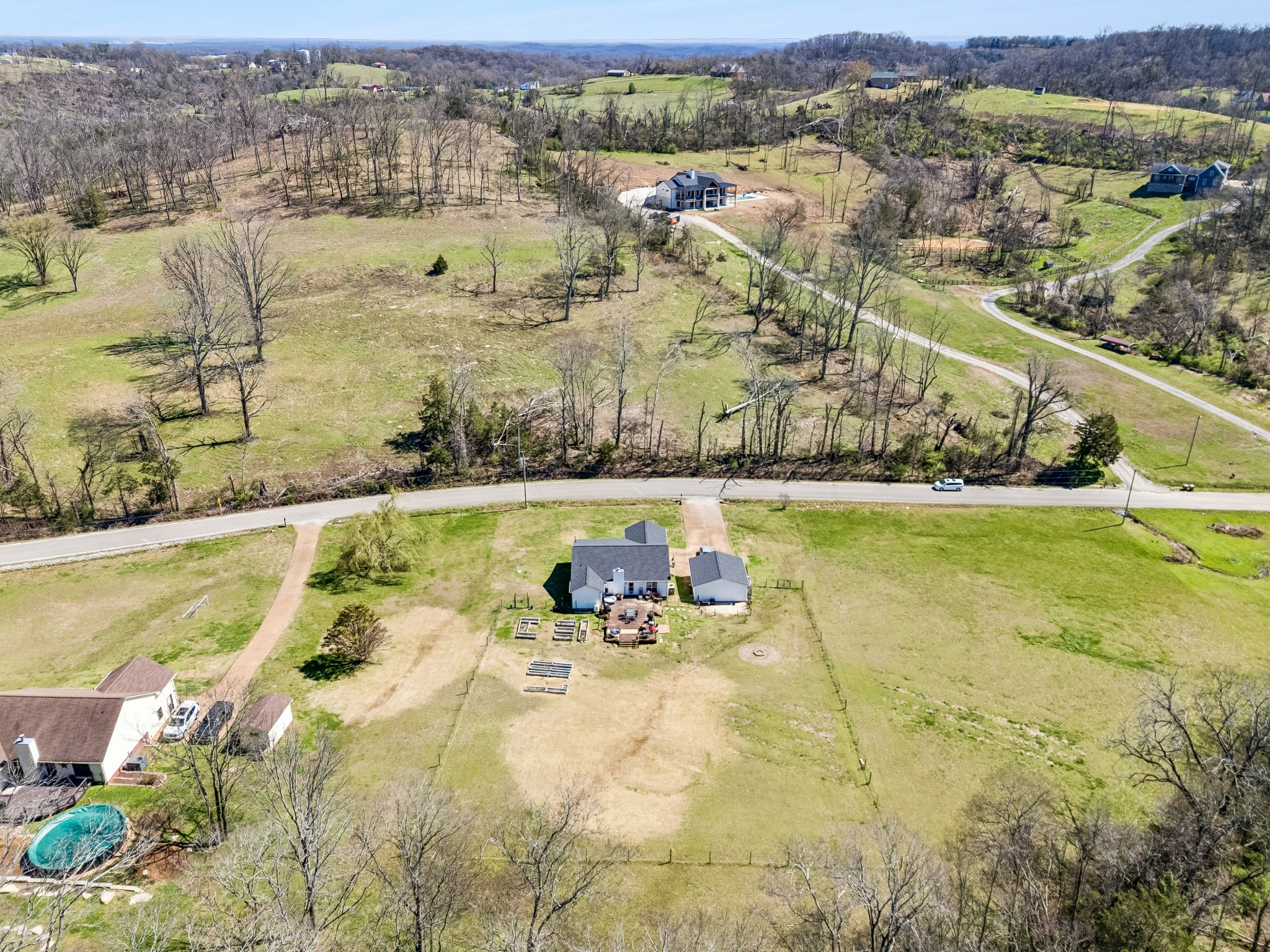 1245 Cliff Amos Road Spring Hill, TN 37174 - Photo 40 of 41 an aerial view of residential houses with outdoor space