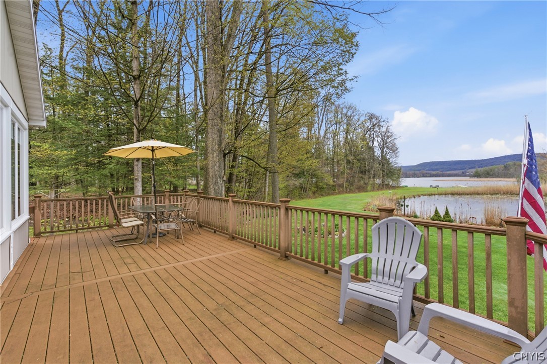 7566 Old Woods Road Preble, NY 13159 - Photo 30 of 50 "House width" deck overlooking your private pond a