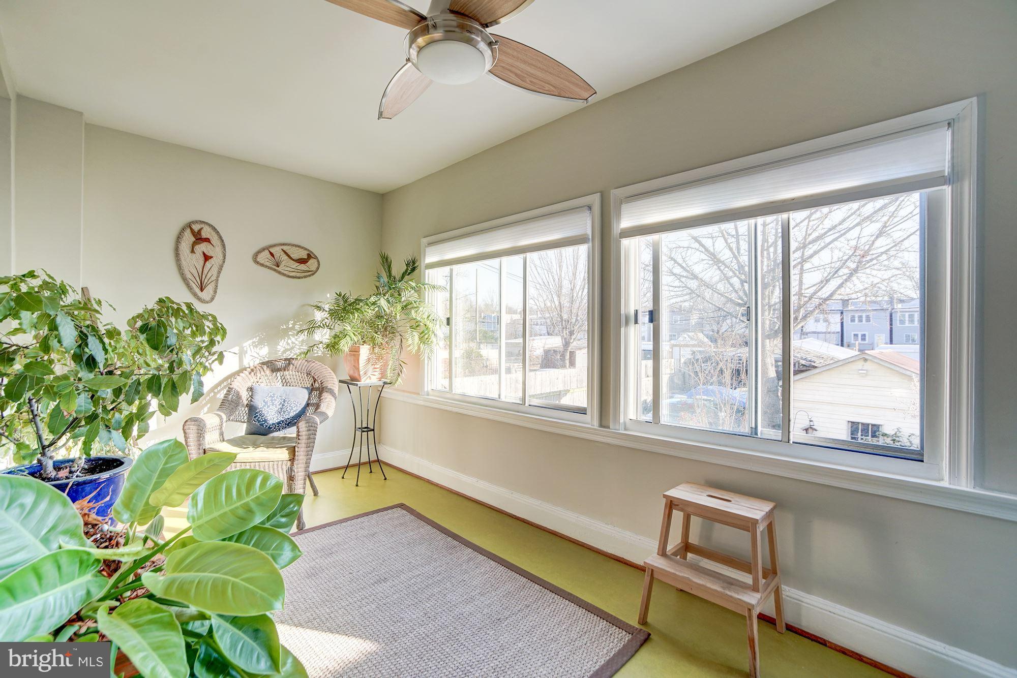 614 Ingraham Street Northwest Washington, DC 20011 - Photo 11 of 31 Sunroom over-looking the garden oasis