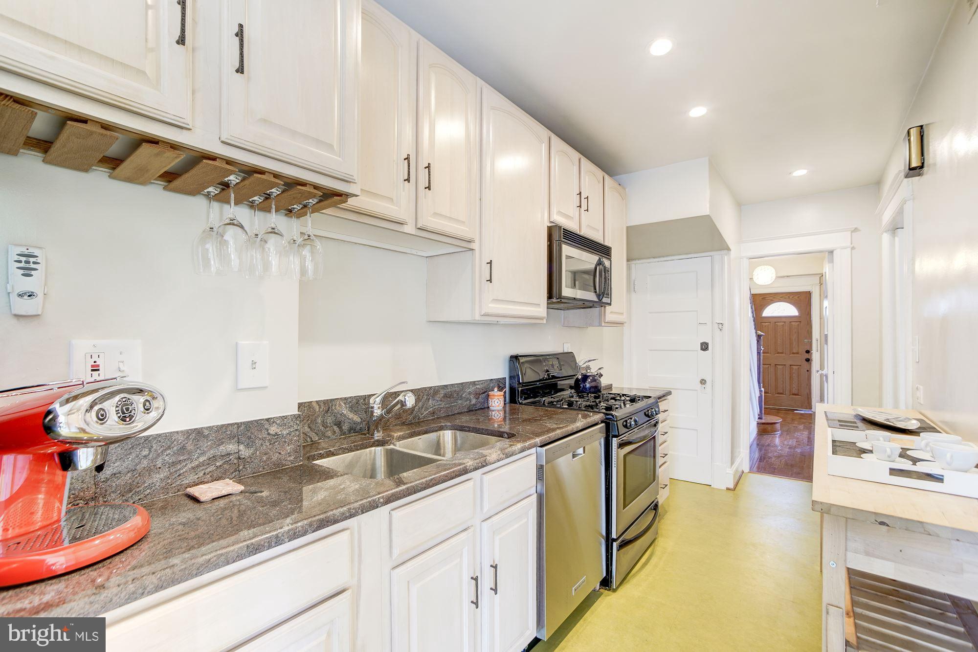 614 Ingraham Street Northwest Washington, DC 20011 - Photo 13 of 31 Updated kitchen with Marmoleum floor