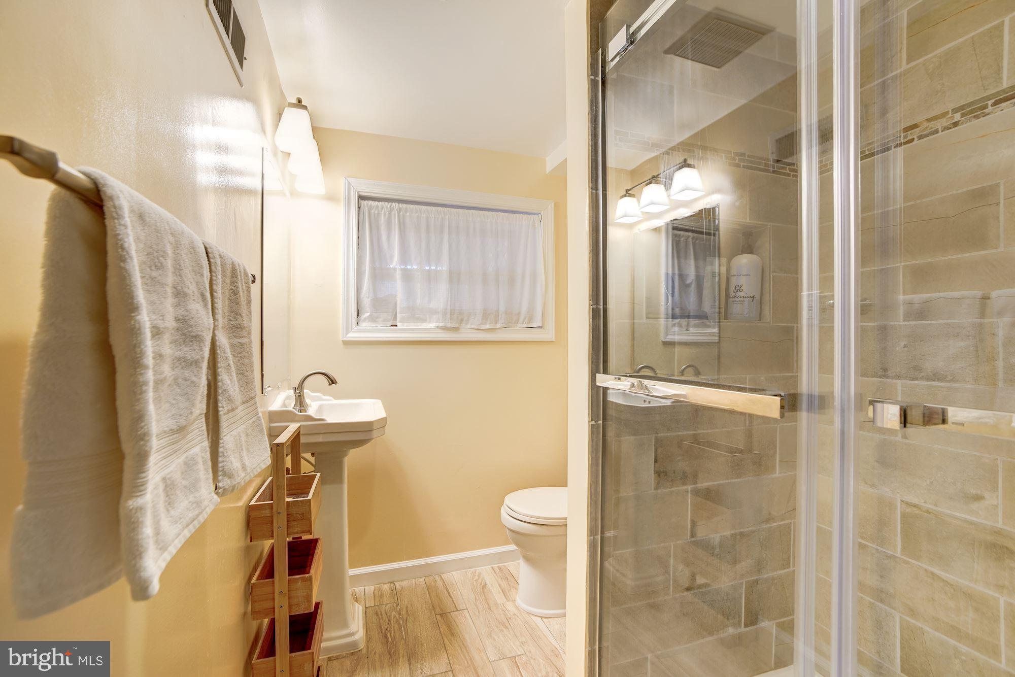 614 Ingraham Street Northwest Washington, DC 20011 - Photo 25 of 31 Updated full-bathroom in the basement