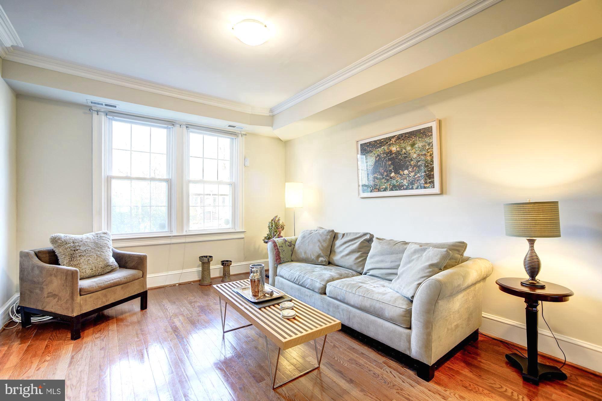 614 Ingraham Street Northwest Washington, DC 20011 - Photo 4 of 31 Spacious living room with natural light