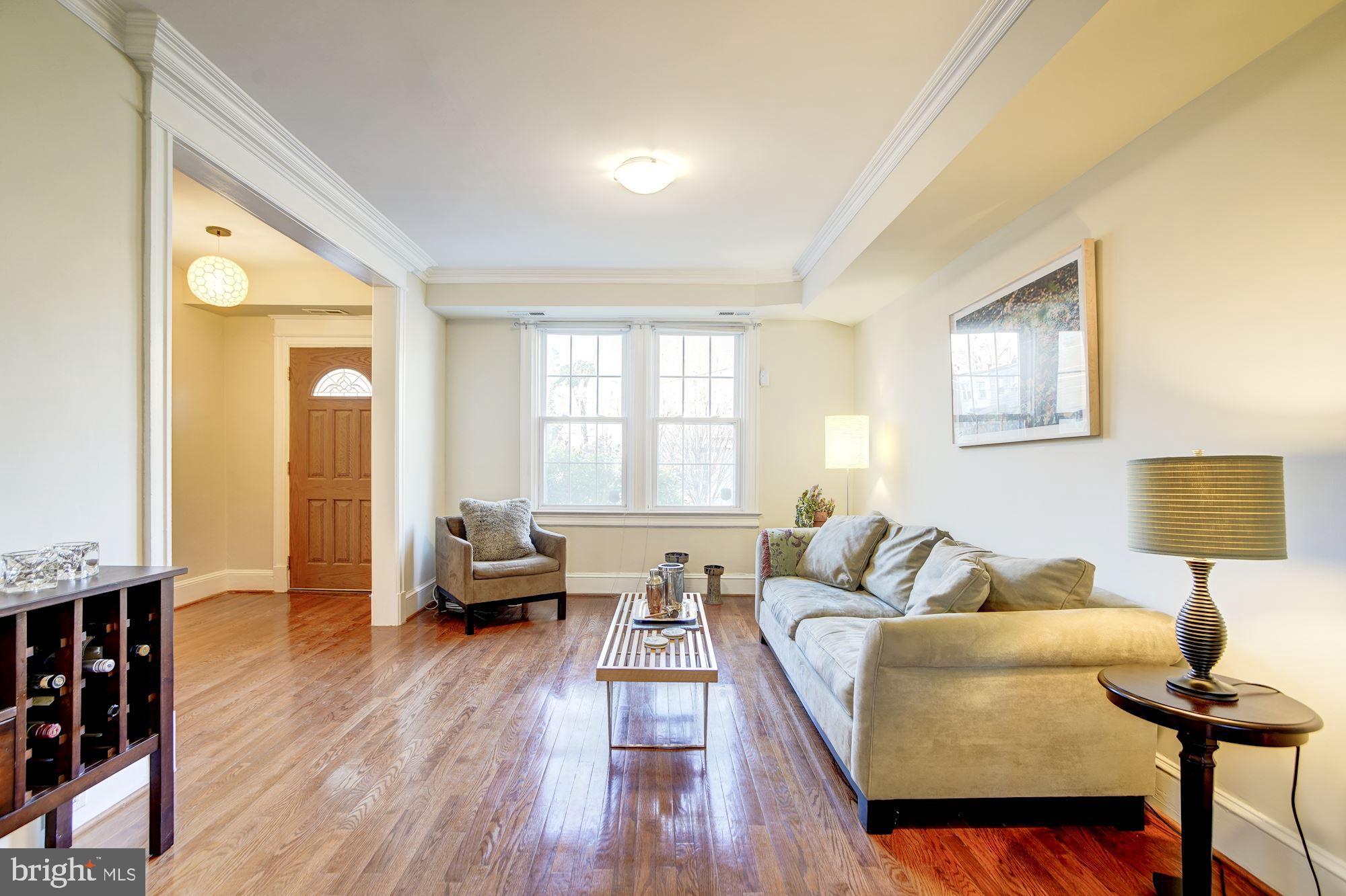 614 Ingraham Street Northwest Washington, DC 20011 - Photo 5 of 31 Lack of front porch makes the living room lighter
