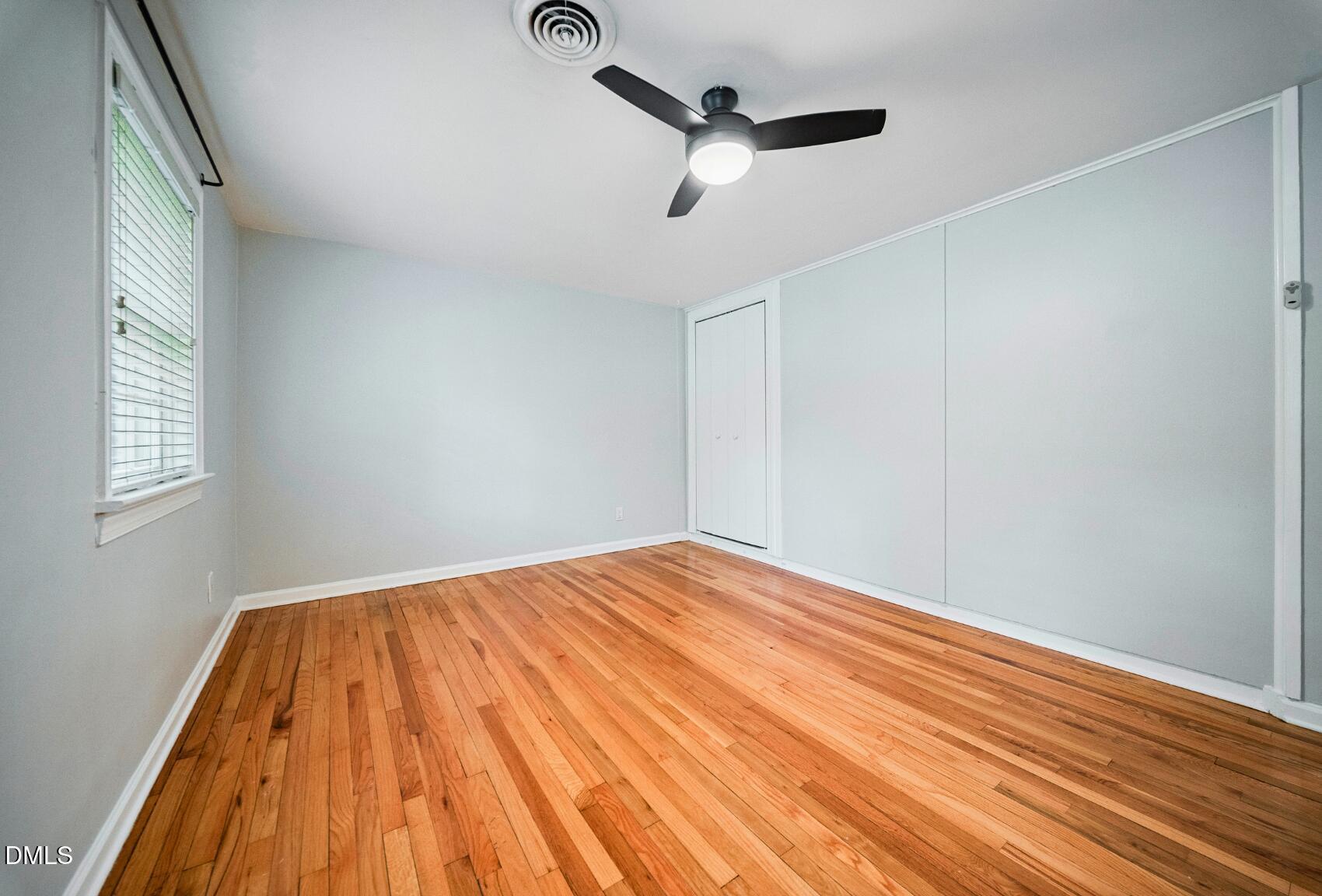 967 St Marys Street Raleigh, NC 27605 - Photo 23 of 34 a view of empty room with wooden floor