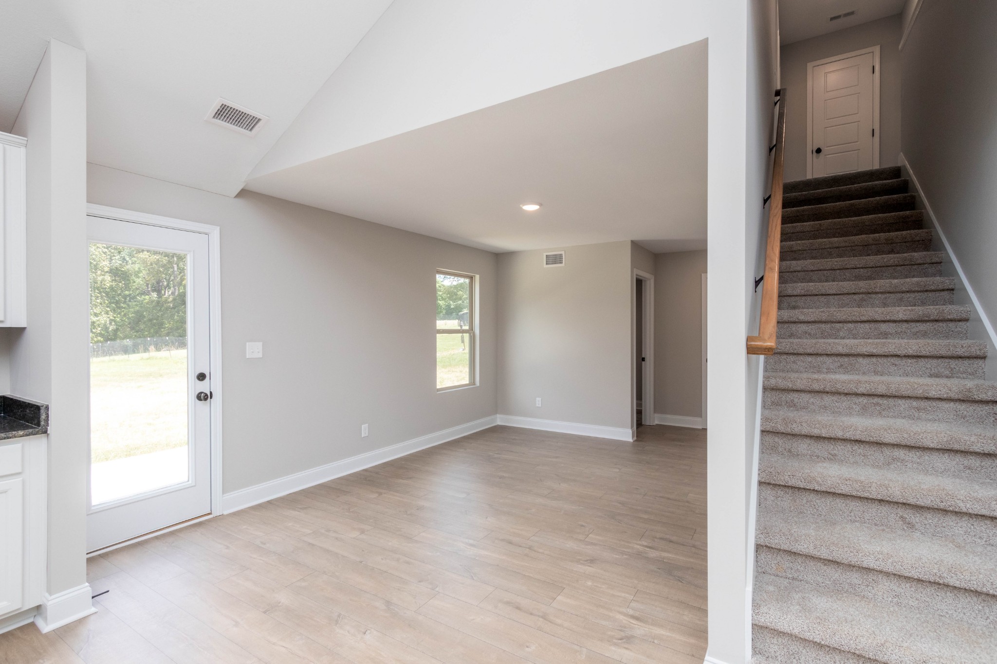 301 Old Columbia Road Dickson, TN 37055 - Photo 14 of 22 a view of an entryway with wooden floor and windows