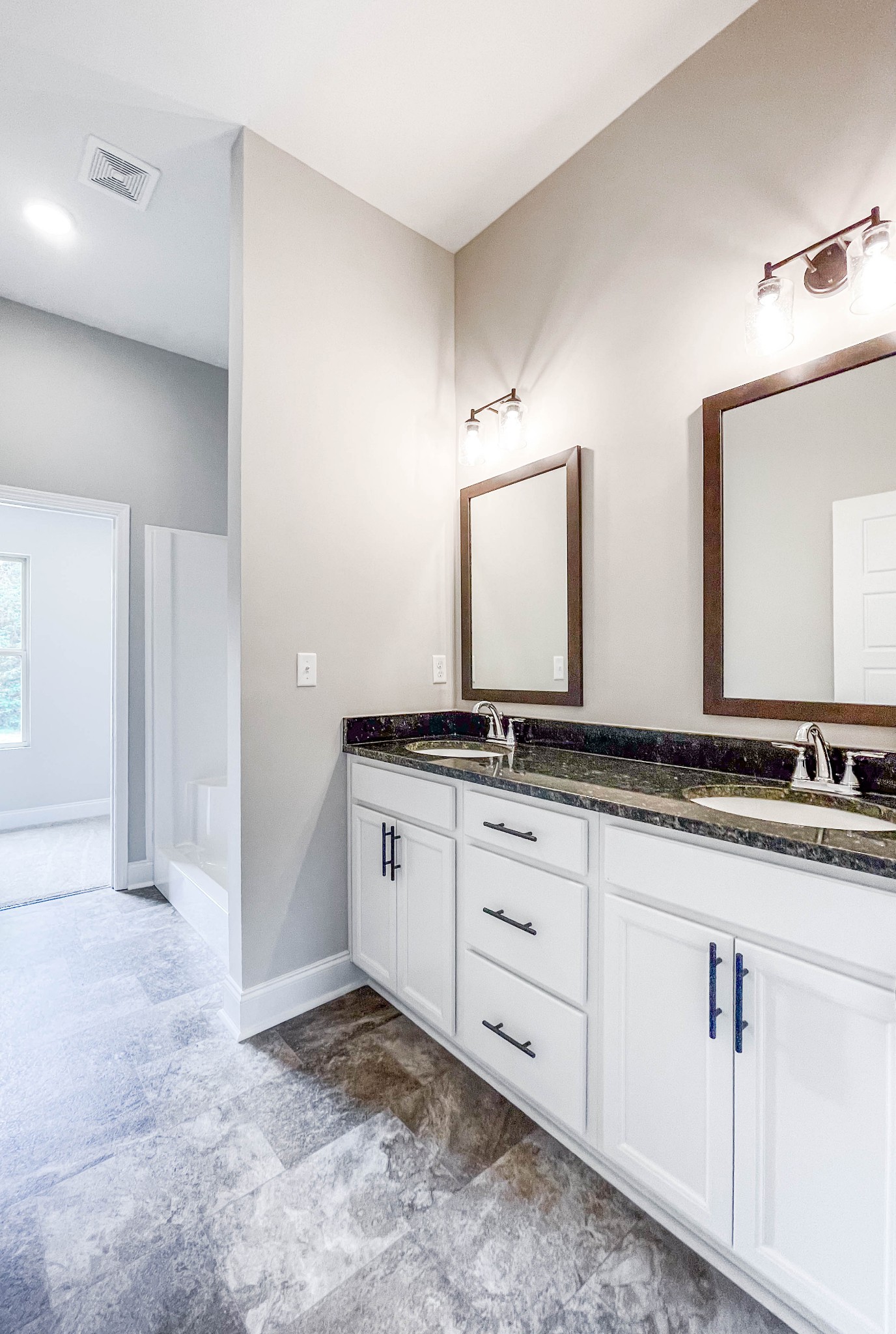301 Old Columbia Road Dickson, TN 37055 - Photo 17 of 22 a bathroom with double sink and a mirror