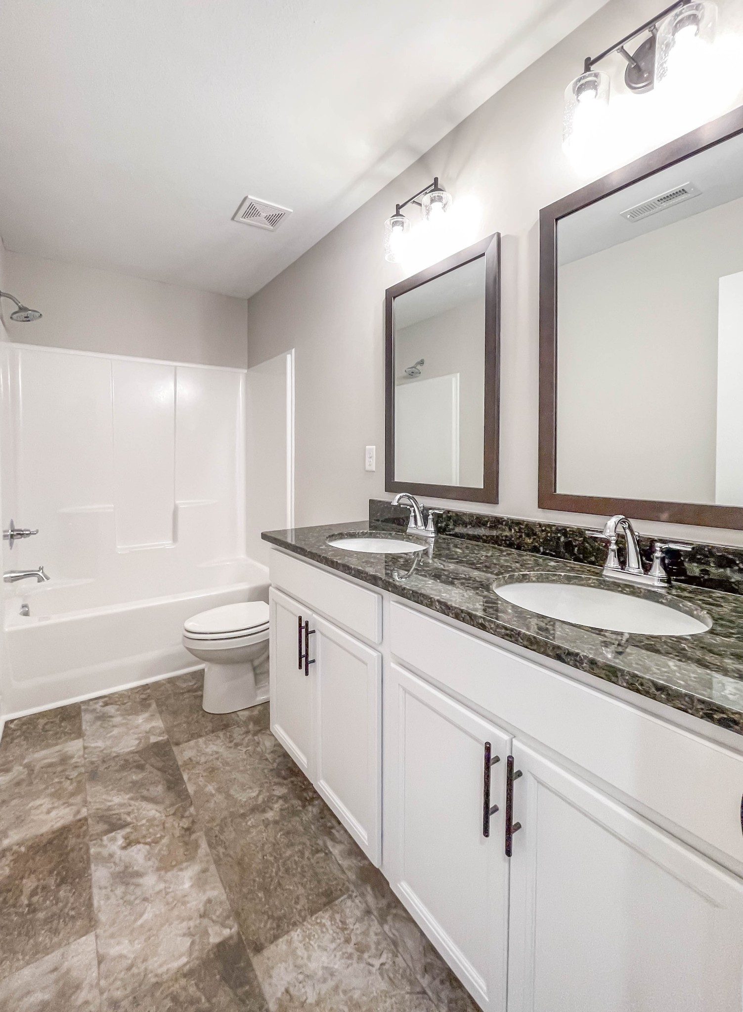 301 Old Columbia Road Dickson, TN 37055 - Photo 20 of 22 a bathroom with a granite countertop sink mirror and bathtub