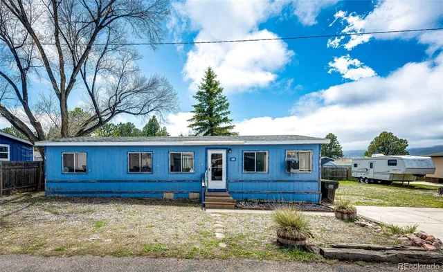 a house view with a backyard space