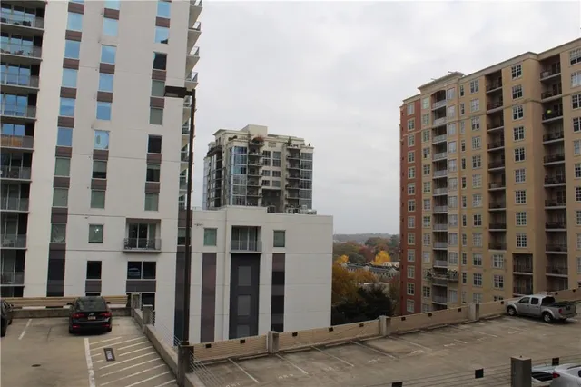 a kitchen with granite countertop a sink and a window