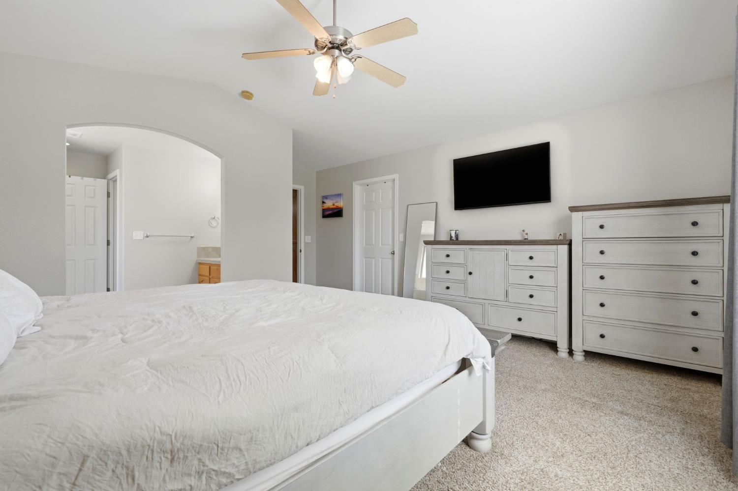1849 West Spring Crest Street Hanford, CA 93230 - Photo 33 of 45 a bedroom with a bed and a flat screen tv