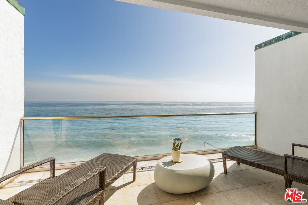 20520 Pacific Coast Highway Malibu, CA 90265 - Photo 15 of 27 a view of a lake from a balcony