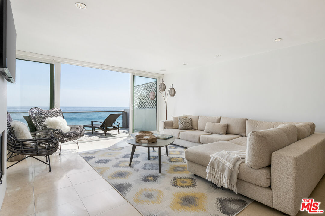 20520 Pacific Coast Highway Malibu, CA 90265 - Photo 2 of 27 a living room with furniture and a couch