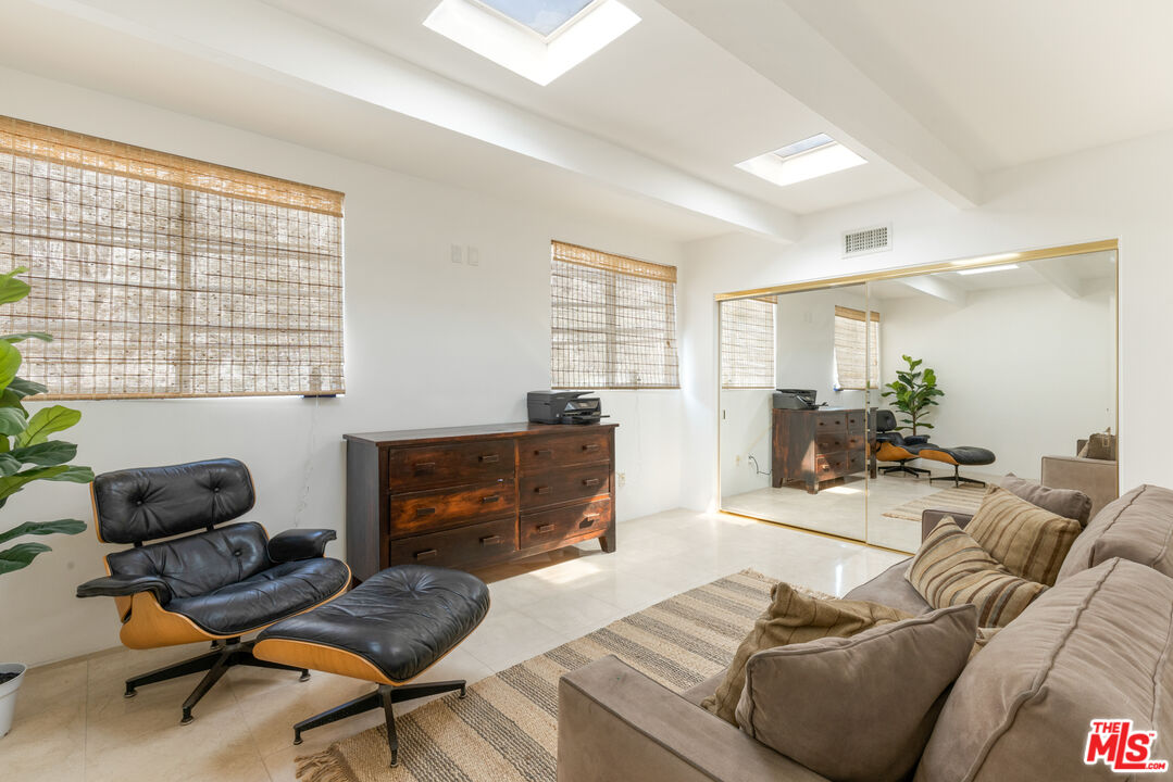 20520 Pacific Coast Highway Malibu, CA 90265 - Photo 24 of 27 a living room with furniture and a window