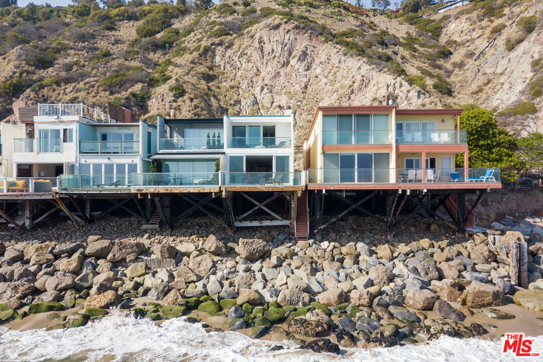 20520 Pacific Coast Highway Malibu, CA 90265 - Photo 26 of 27 a front view of house with a yard covered with green space