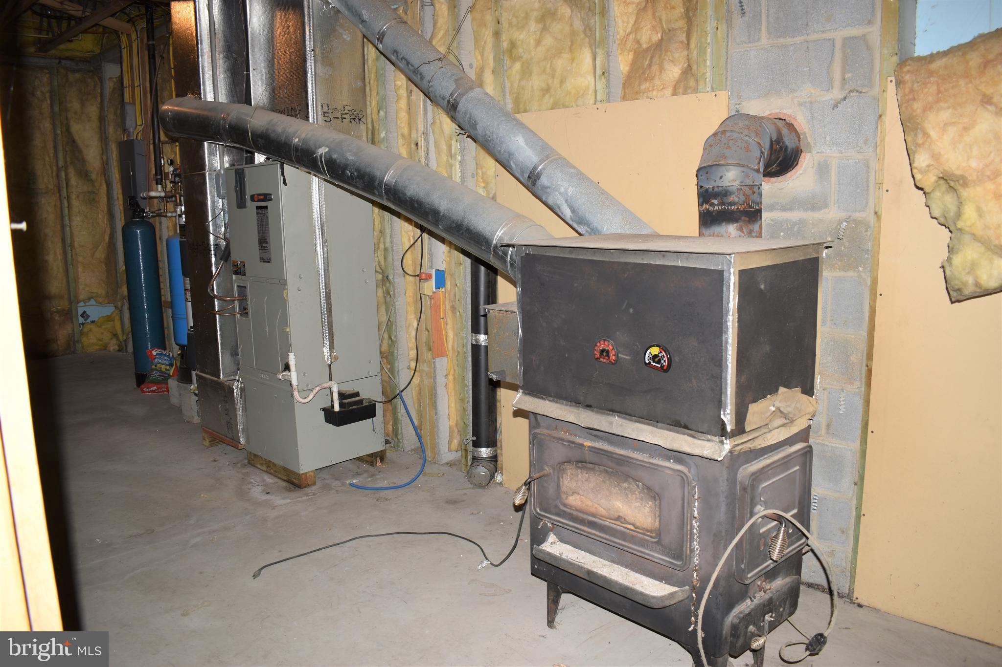 13704 Orchard Ridge Road Hancock, MD 21750 - Photo 21 of 27 Secondary heat is wood stove for whole house heati