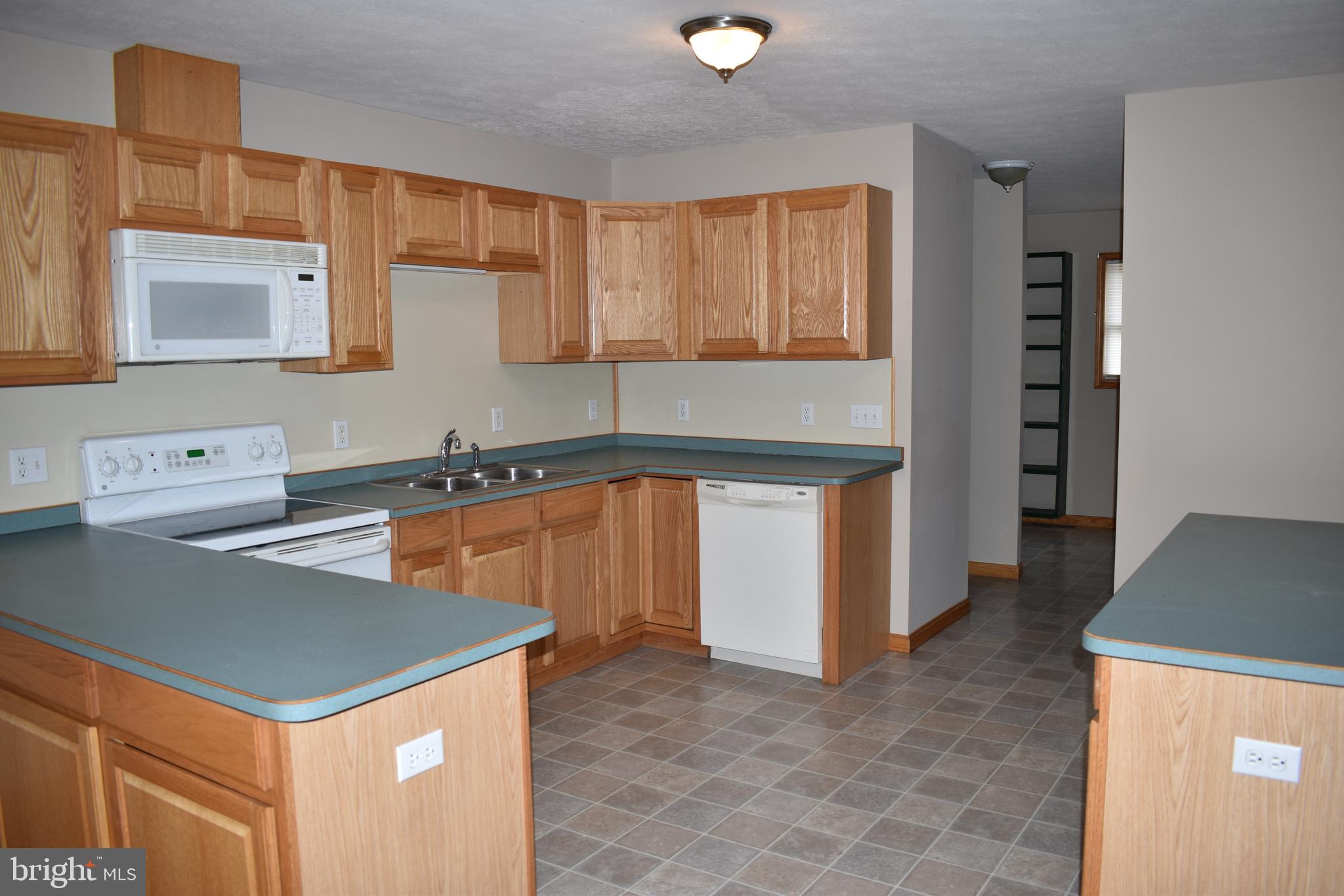 13704 Orchard Ridge Road Hancock, MD 21750 - Photo 5 of 27 Spacious kitchen with ample cabinets
