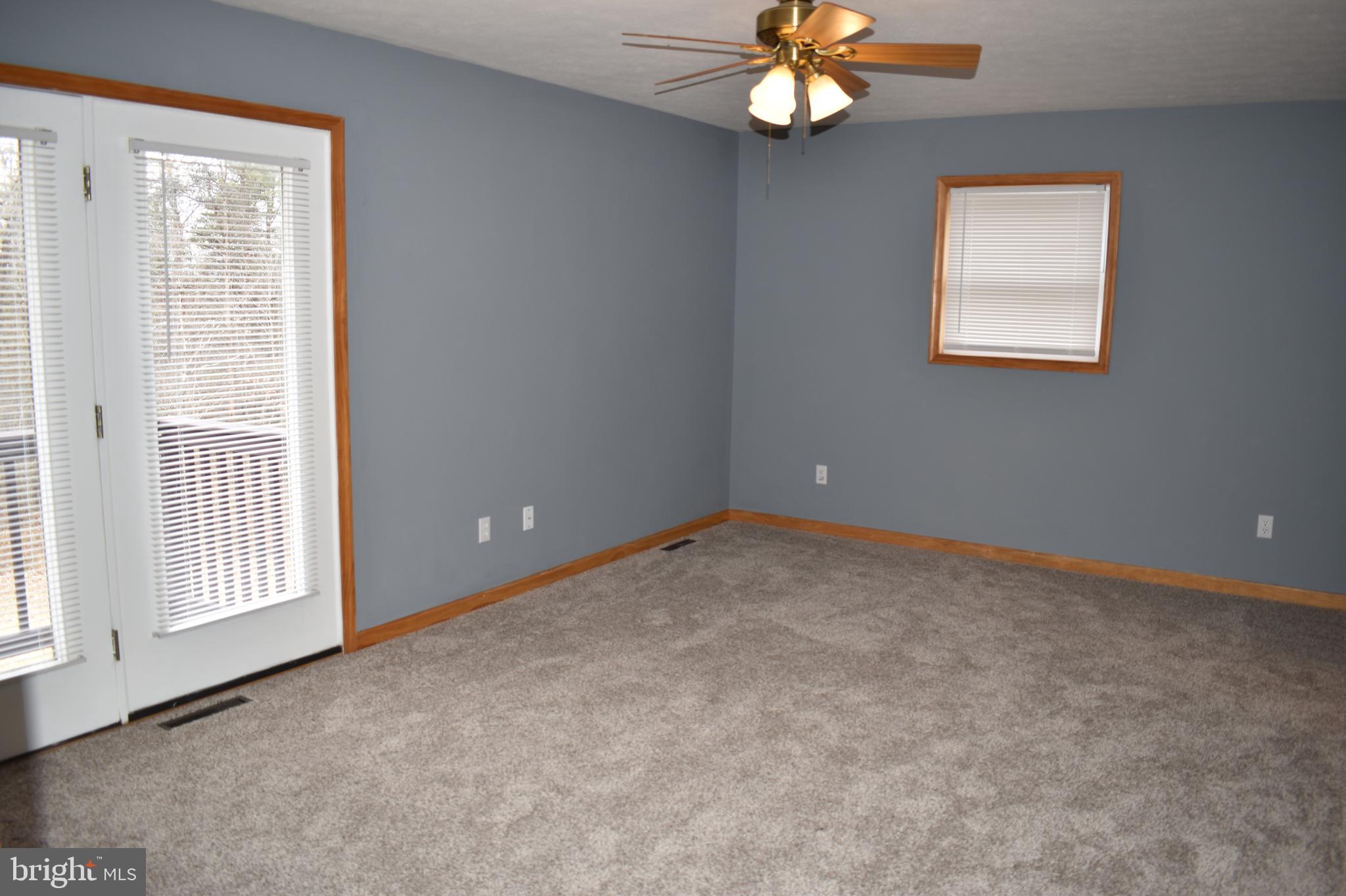 13704 Orchard Ridge Road Hancock, MD 21750 - Photo 7 of 27 Primary bedroom balcony w/deck-new carpet