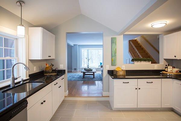 130 Blackstrap Road Falmouth, ME 04105 - Photo 3 of 30 Sleek new white kitchen with black...