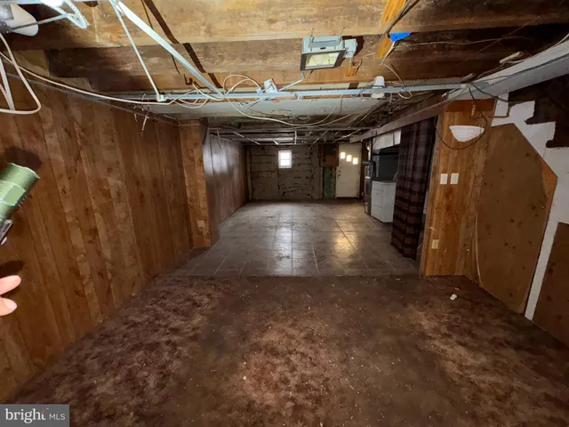 a view of a garage with wooden floors