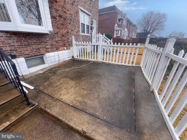 a view of a porch with a bench