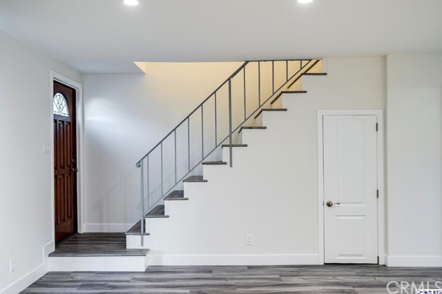 1050 Spazier Avenue, Unit 5 Glendale, CA 91201 - Photo 13 of 27 a view of entryway and hall with wooden floor