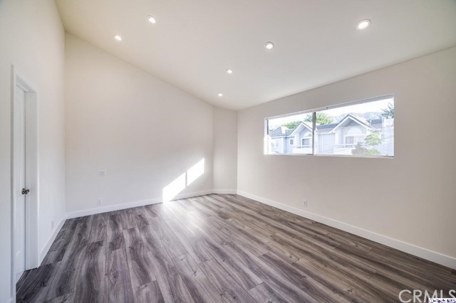 1050 Spazier Avenue, Unit 5 Glendale, CA 91201 - Photo 14 of 27 a view of an empty room and a window