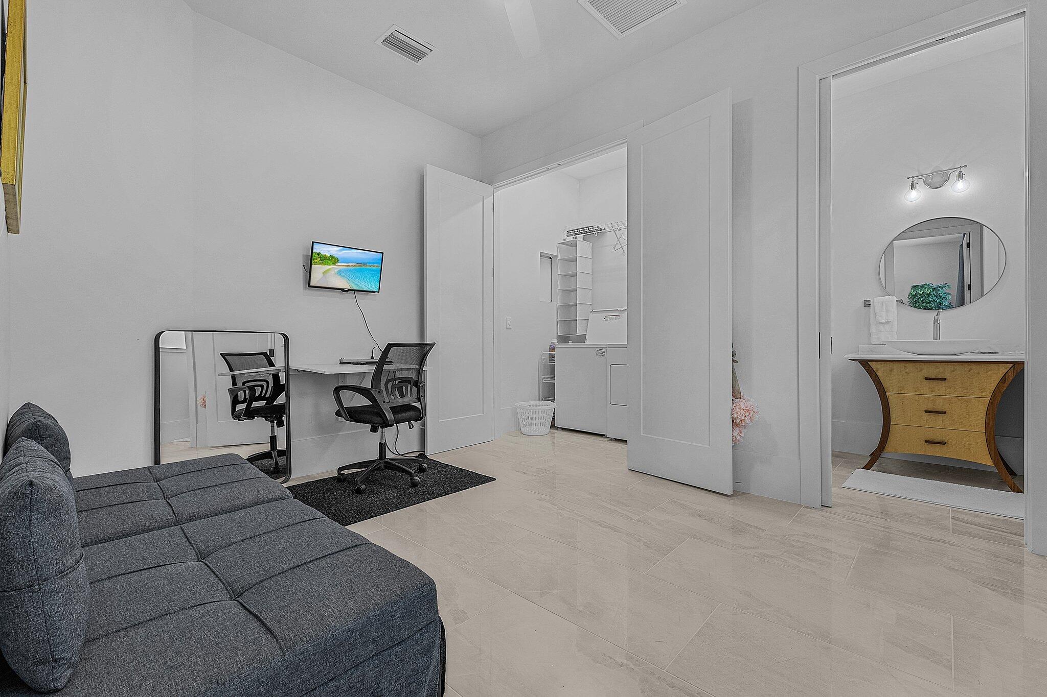 2499 Pine Street Naples, FL 34112 - Photo 14 of 18 a living room with furniture