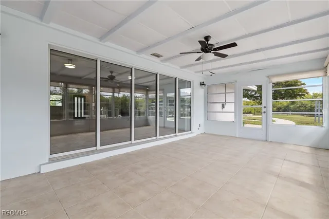 a view of an empty room with a sliding door