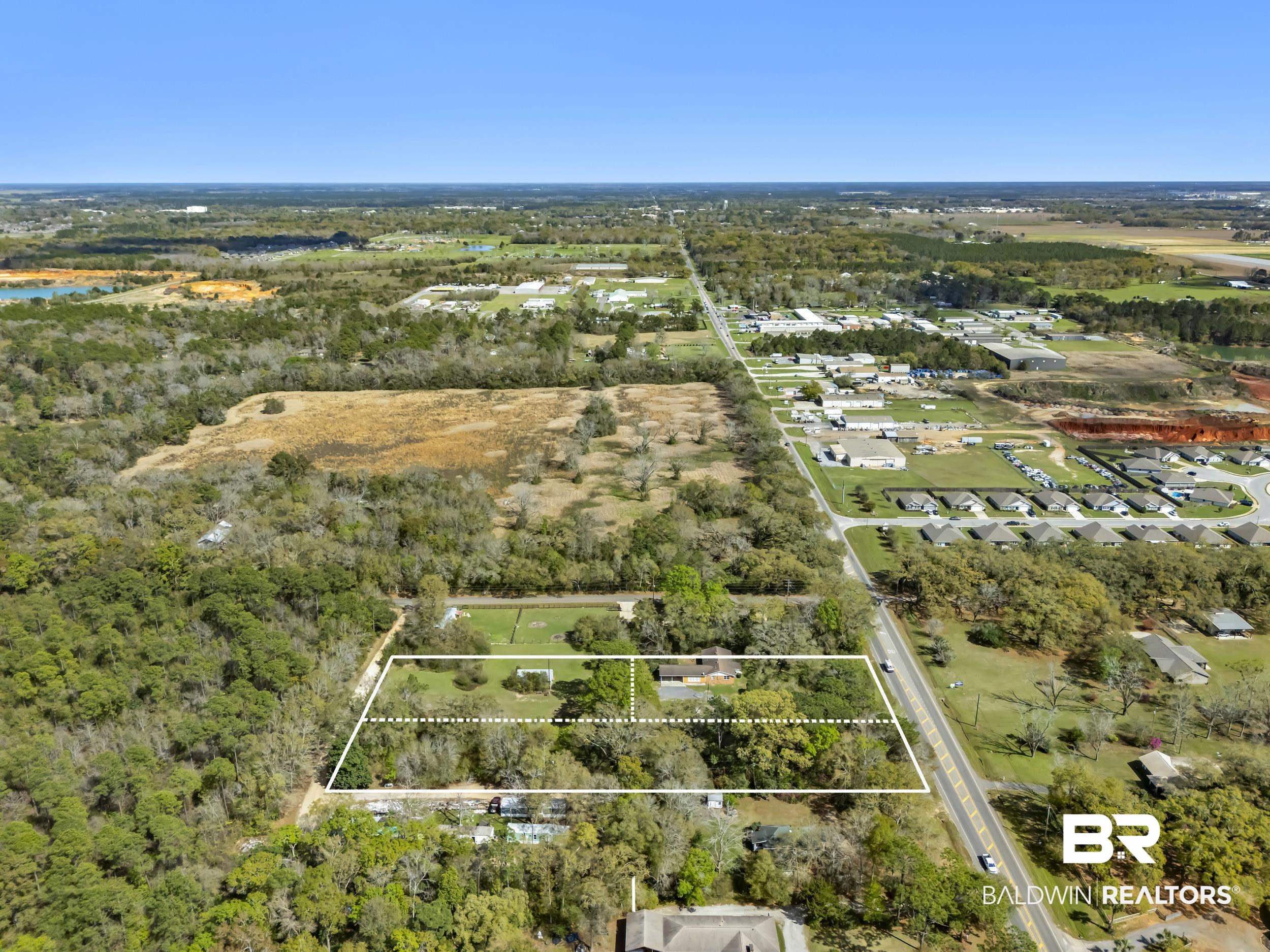 17463 Highway 98 Foley, AL 36535 - Photo 33 of 57 Aerial view of residential area with property boundaries highlighted