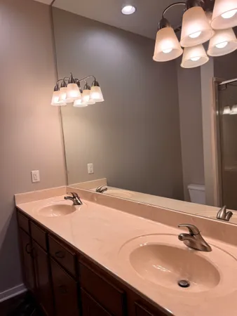 a bathroom with a shower and a toilet