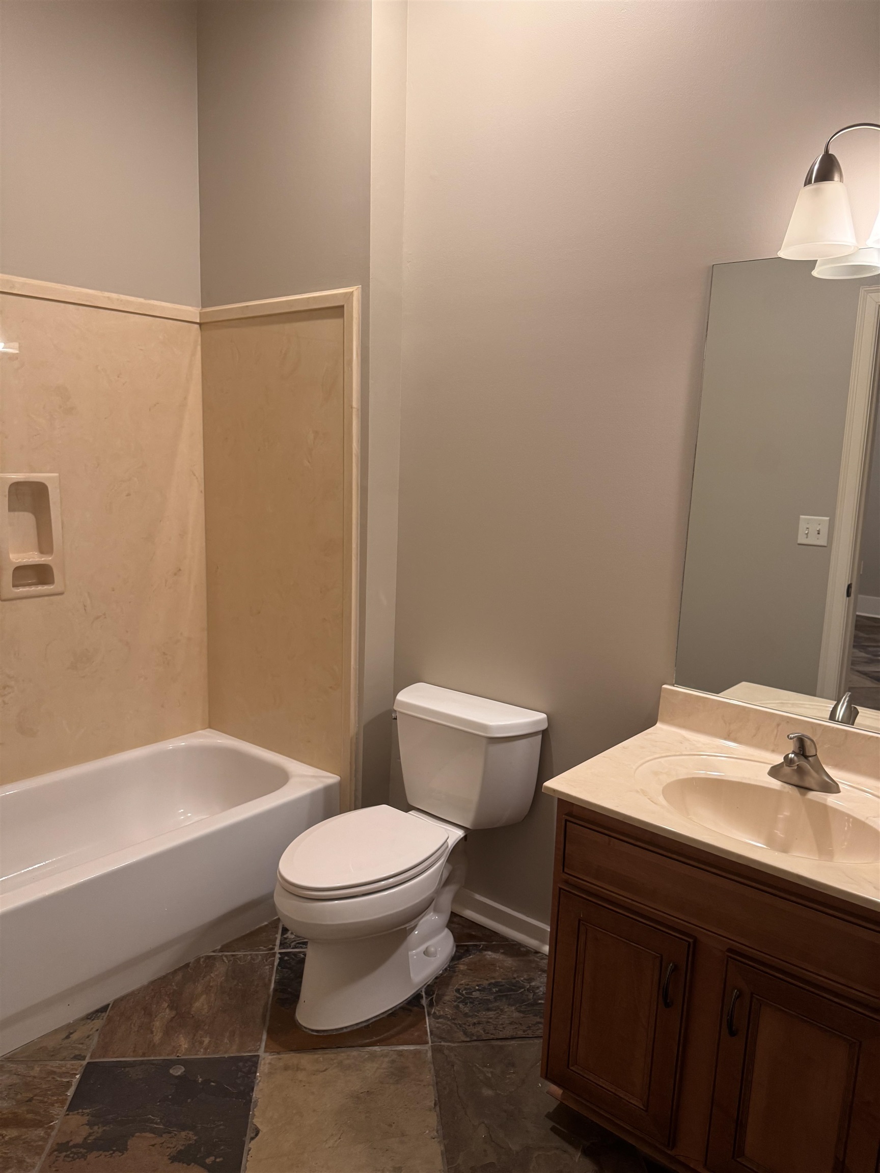 620 Tennessee Street Memphis, TN 38103 - Photo 23 of 34 a bathroom with a sink a toilet and shower