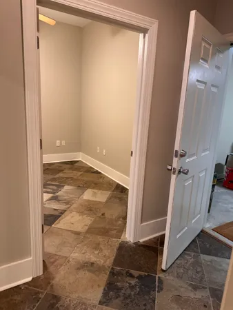 a view of a room with an empty space