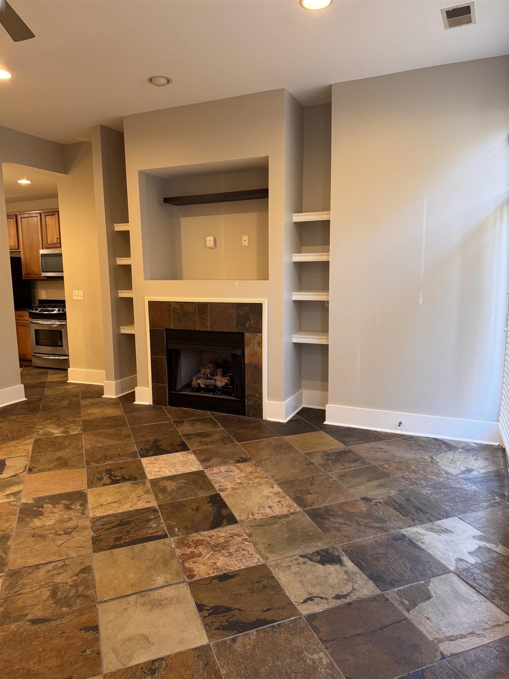 620 Tennessee Street Memphis, TN 38103 - Photo 4 of 34 a view of an empty room with a fireplace
