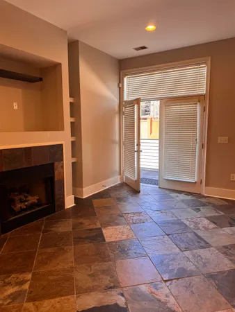 a living room with a fireplace