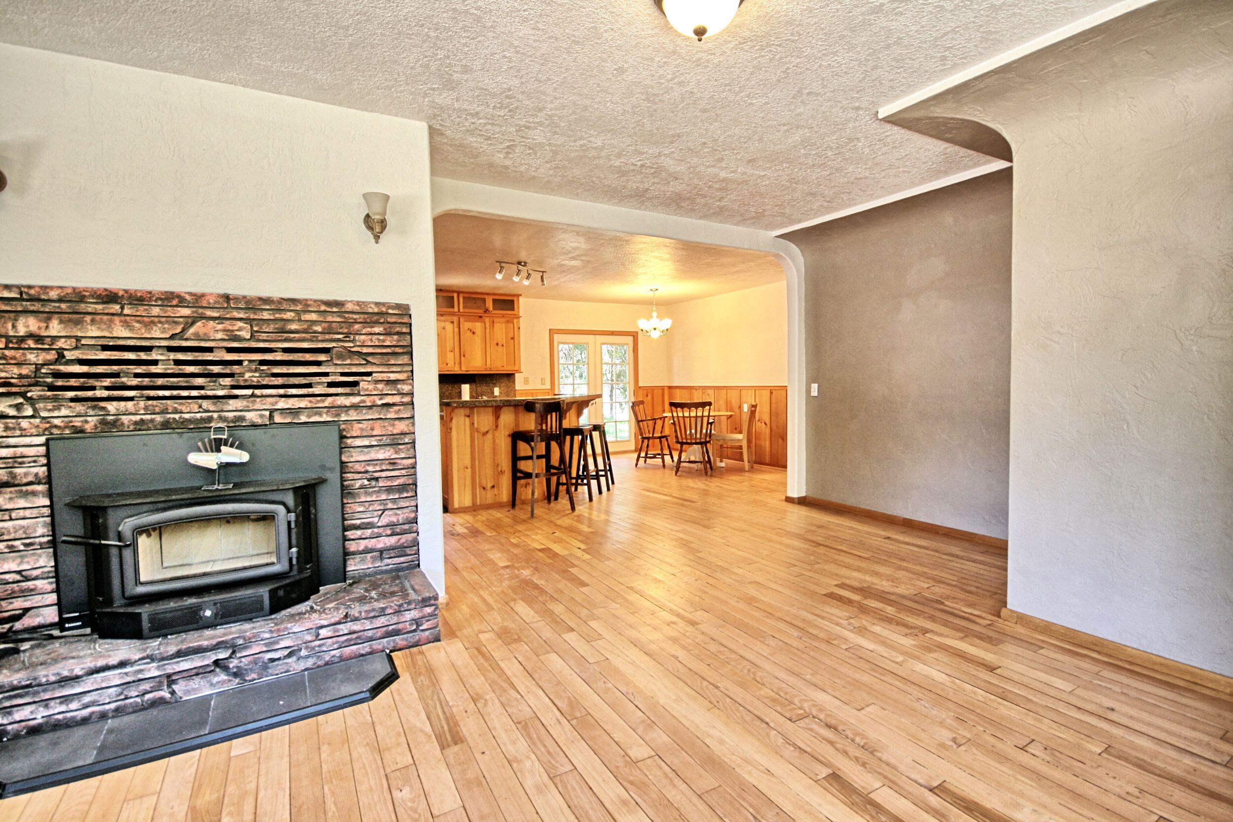 199 Powell Creek Road Williams, OR 97544 - Photo 17 of 57 a view of living room with furniture and fireplace