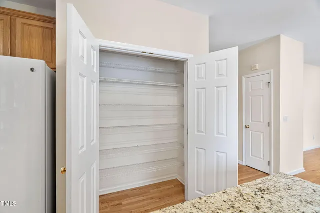 a bathroom with a sink a mirror and a shower