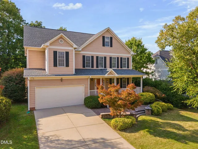 a view of a bedroom walk in closet and bedroom