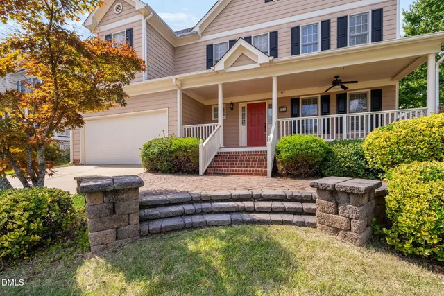 a bathroom with a sink double vanity and a mirror