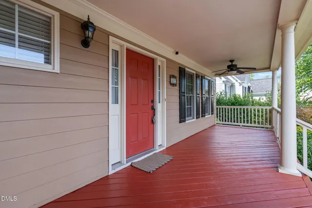 a view of room with window and wooden floor
