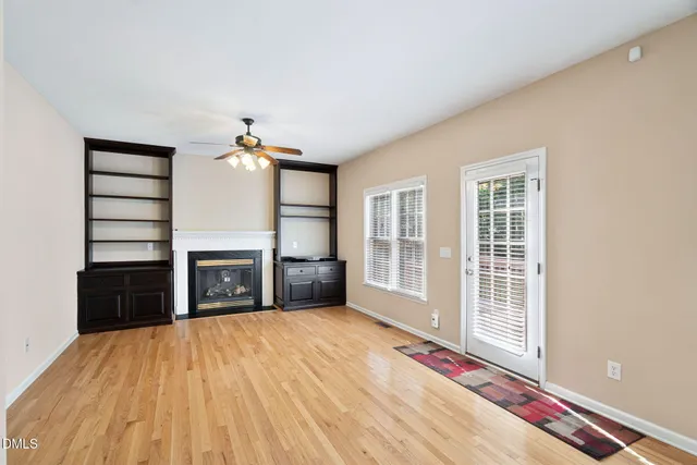 a kitchen with stainless steel appliances granite countertop a stove and a refrigerator