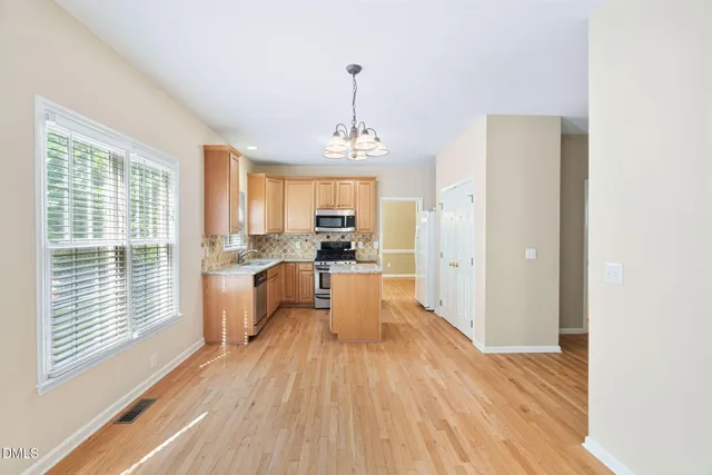 $725,000 | 302 Peachtree Point Court, Cary, NC 27513