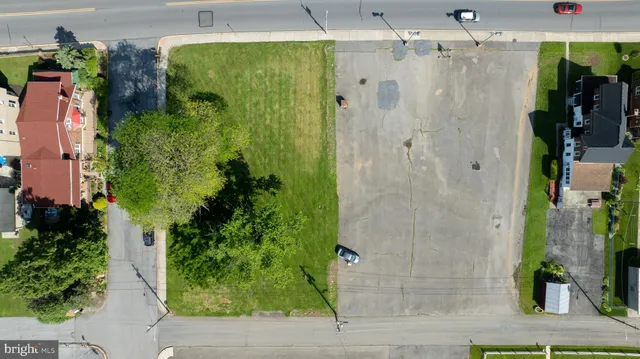 a bathroom with a shower and a mirror