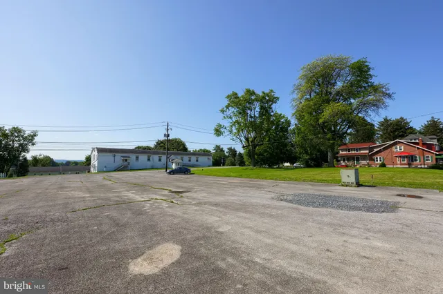 a house with trees in the background