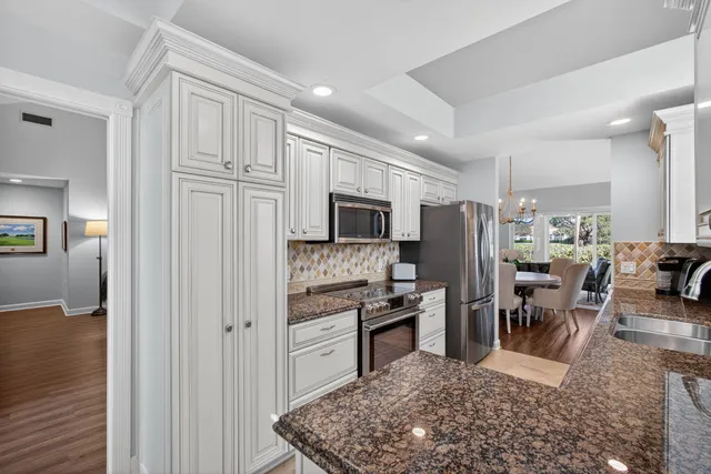 a bedroom with a bed couch and window