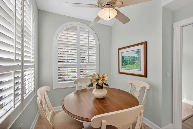 a bathroom with a sink a mirror and a shower