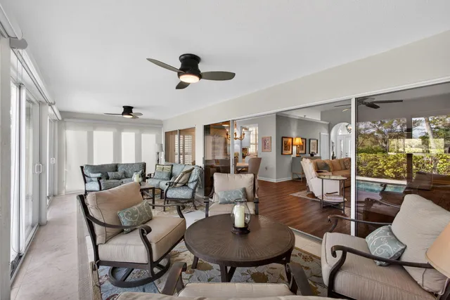 a bedroom with two beds and a flat screen tv