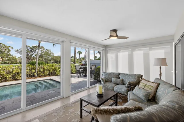 a view of a chairs and table in the patio