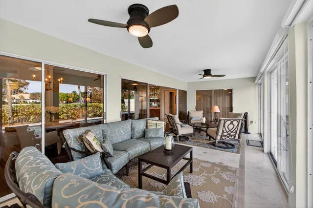 a view of a swimming pool with chairs