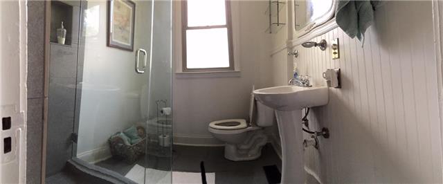 403 North Oak Street Springfield, TN 37172 - Photo 15 of 20 a bathroom with a sink toilet and shower